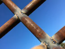Farm Fence Weld Wide Shot in Loch Lloyd